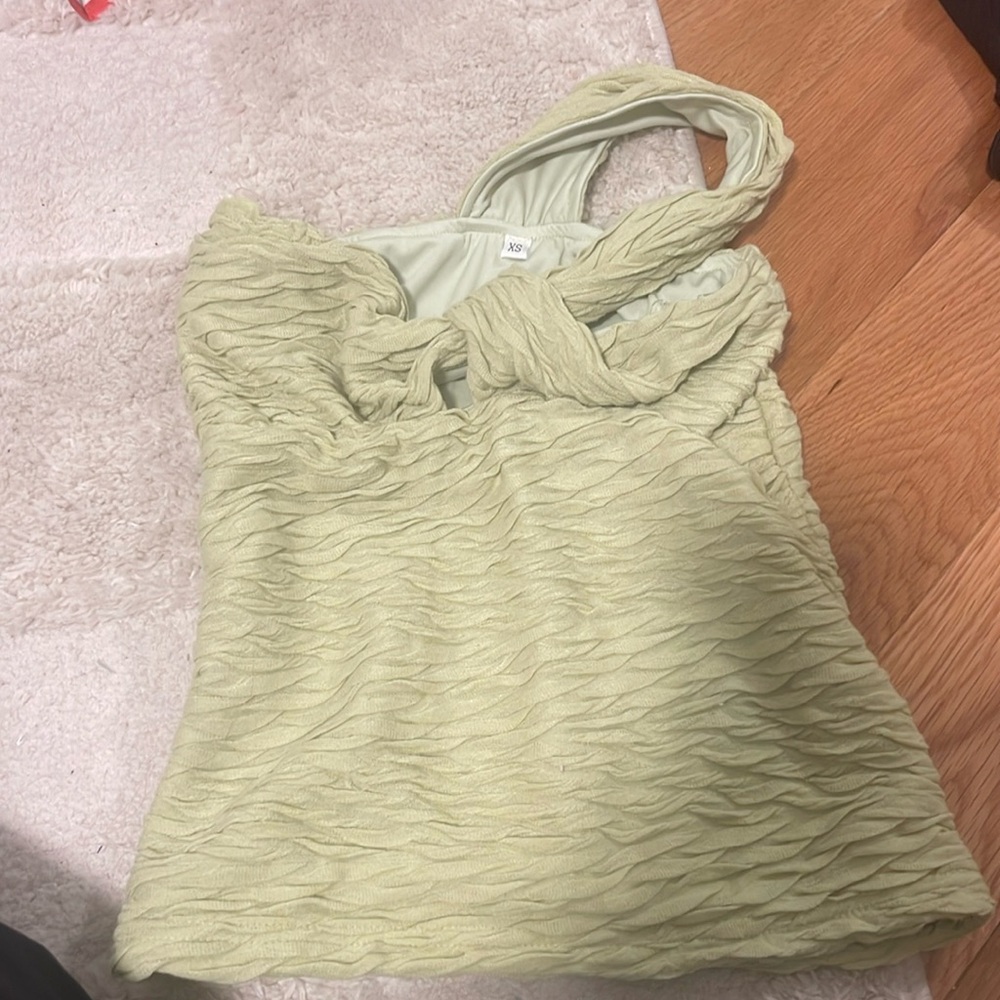 One shoulder green top
